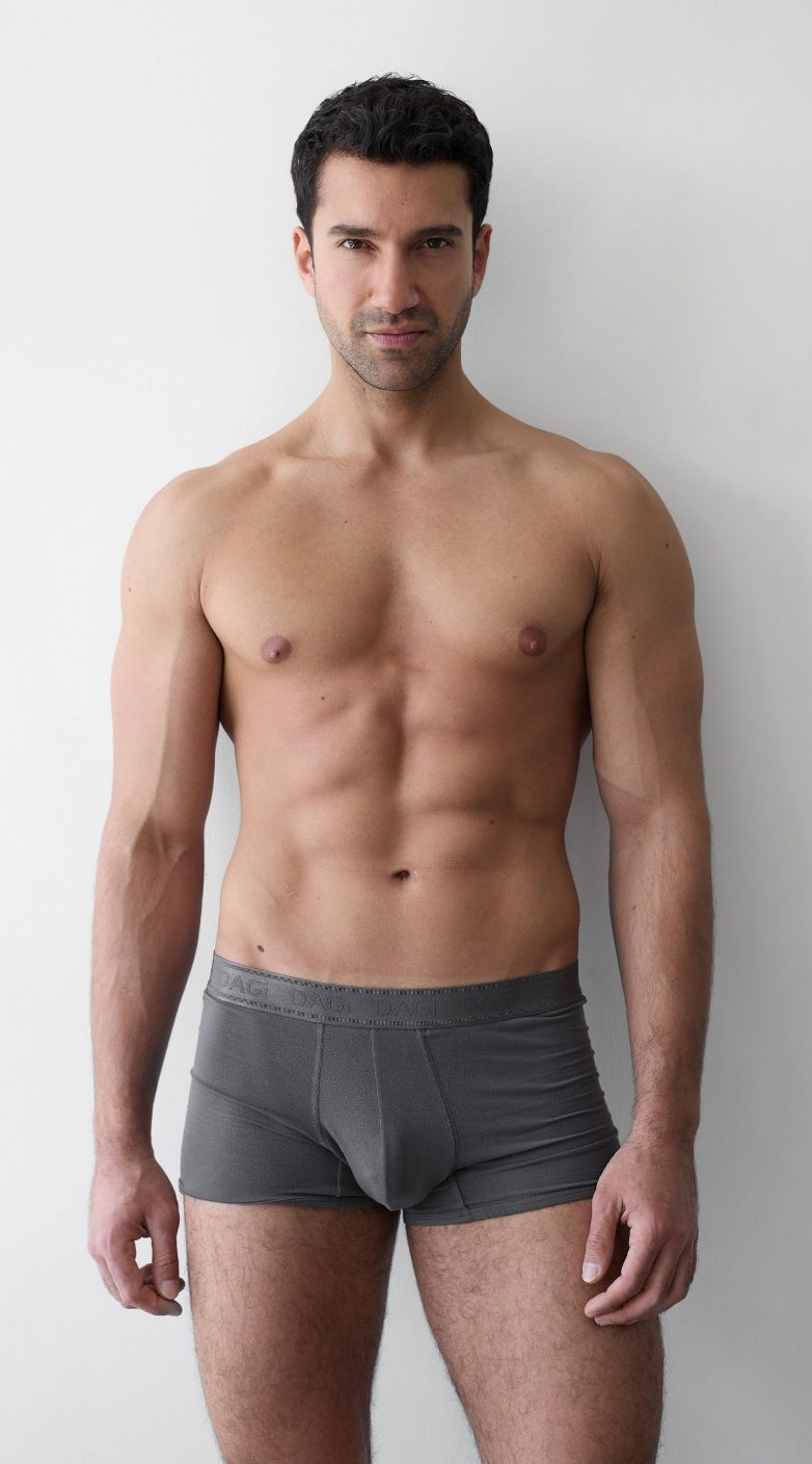 Half-body digital of a male model, front view, plain background