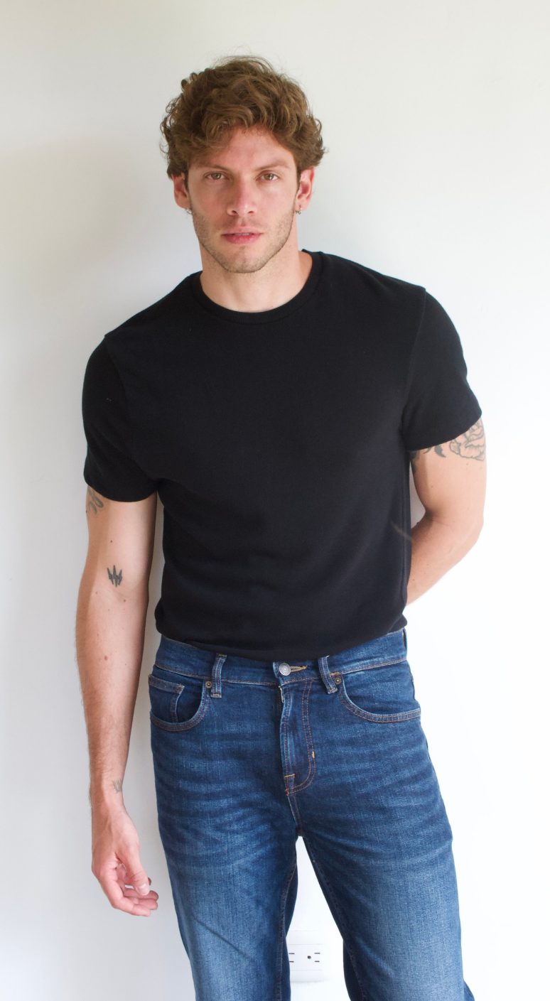 Natural pose option 1 for a male model's digitals, plain background