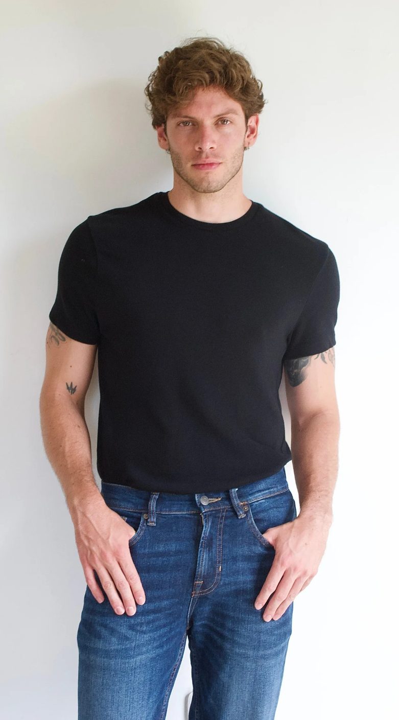 Natural pose option 2 for a male model's digitals, plain background